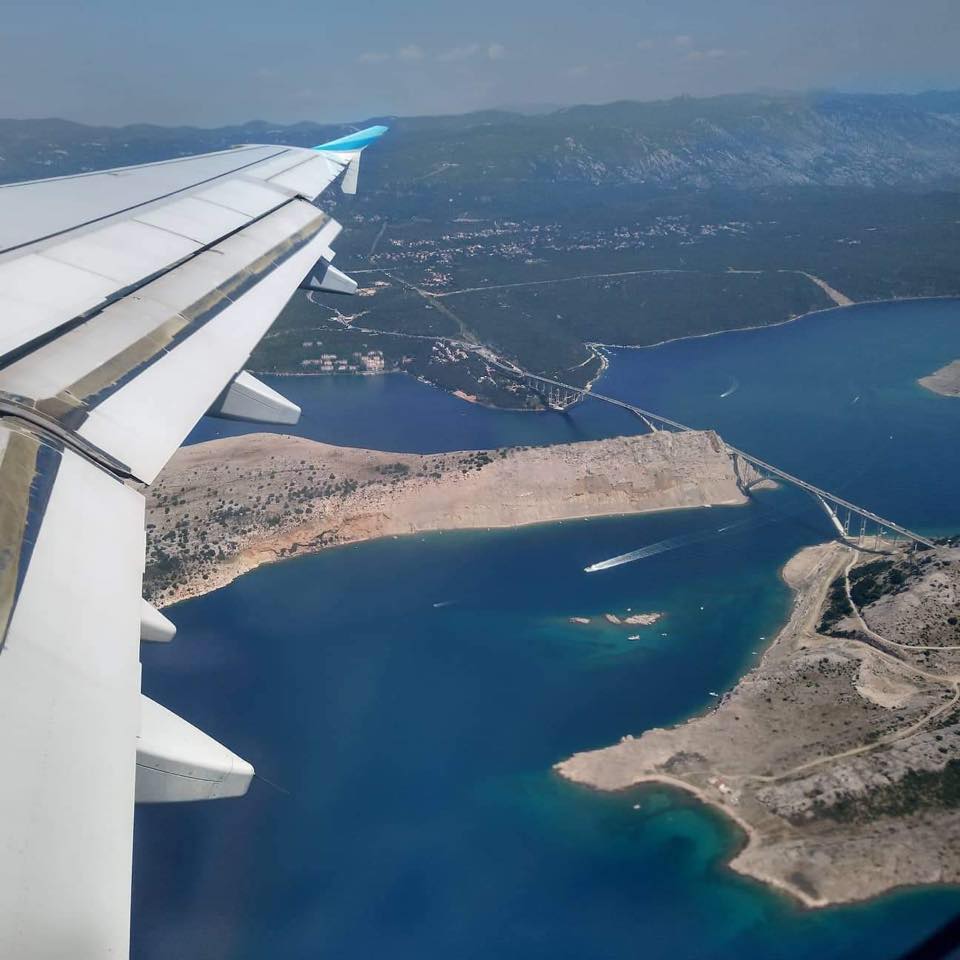View of the Krk Bridge from a plane (photo by Marin Ikica, image source: Rijeka Airport)