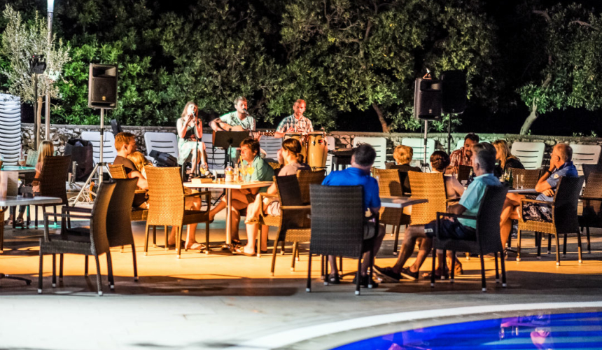 Evening entertainment by the pool at Dražica hotel in Krk
